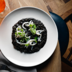 Venice & Risotto al Nero di Seppia: A Dish as Mysterious as the City